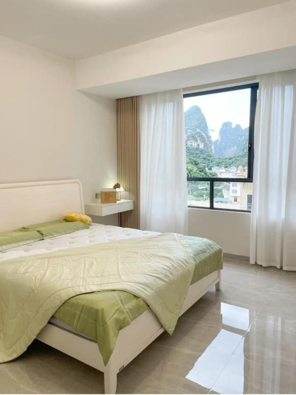 Đôi vợ chồng trẻ trang trí nhà rộng 128m2 phong cách tối giản - Hình 9 Doi vo chong tre trang tri nha rong 128m2 phong cach toi gian-Hinh-9