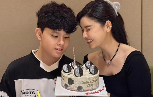 Quý tử nhà Trương Quỳnh Anh cao 1m8 vượt mẹ - Hình 2 Quy tu nha Truong Quynh Anh cao 1m8 vuot me-Hinh-2