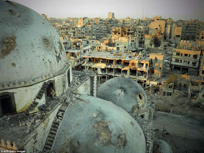 Homs, thành phố lớn thứ 3 của Syria, sầm uất một thời nay dường như biến thành thành phố chết với đống đổ nát tan hoang.