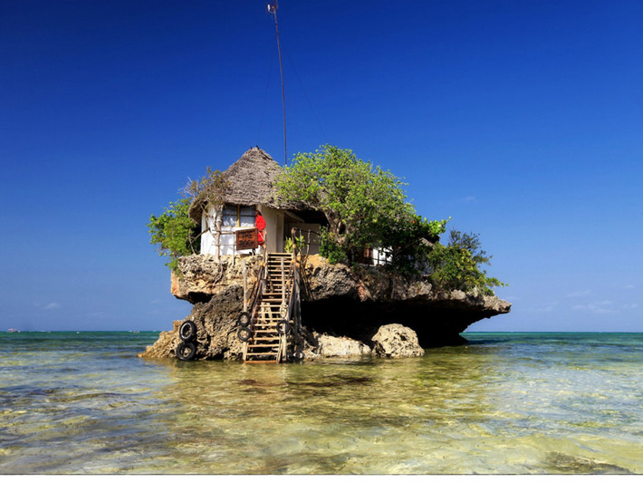 The Rock (Zanzibar). Nhà hàng tương đối trẻ khi mới được khánh thành năm 2010. The Rock nằm trên một tảng đá lớn của đảo Zanzibar. Đối với khách hàng, đến với The Rock không chỉ để ăn những món ngon mà còn để trải nghiệm hành trình thú vị.