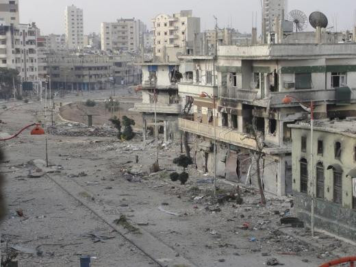 Một khu phố hoang tàn, đổ nát giữa thủ đô Damascus.
