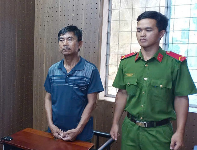 Hoàng Phước Hiếu tại cơ quan Công an. mauthuangiadinh.jpg