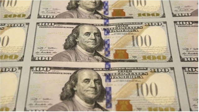Chân dung của Benjamin Franklin được in trên tờ 100 USD. Ảnh: AP Chân dung của Benjamin Franklin được in trên tờ 100 USD. Ảnh: AP