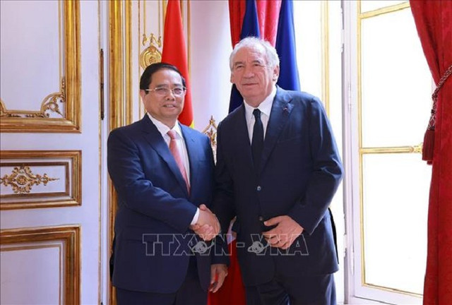 Thủ tướng Phạm Minh Chính và Thủ tướng Pháp François Bayrou. Ảnh: Dương Giang/TTXVN chinh-4.png