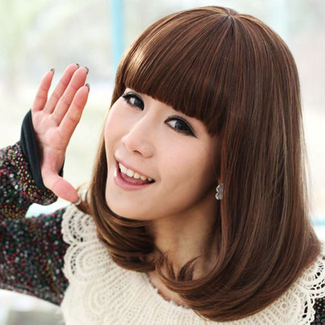 Mái tóc suông sấy cụp đuôi cũng có thể khiến bạn chiếm trọn cảm tình của chàng trong buổi tối hẹn hò. Ảnh: Hairstyle.