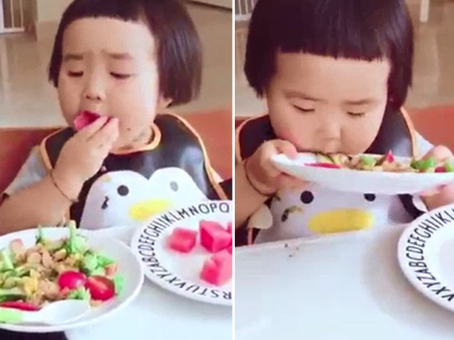 6. Bé ăn như kiểu: "Cả thế giới này chỉ có mình em" vậy. Ảnh: baophunuonline.info.