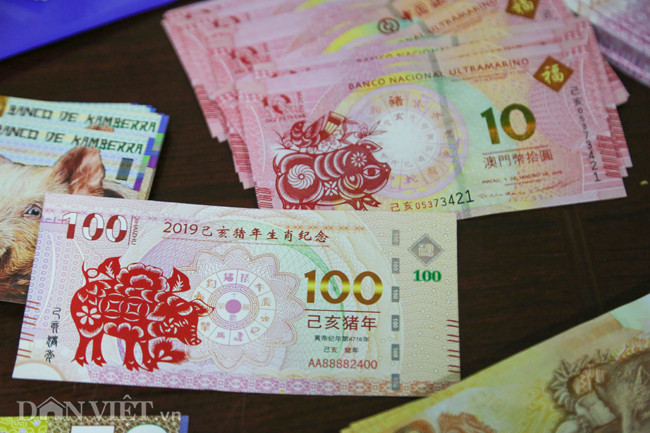 Tờ tiền 100 Patacas và 10 Patacas in hình heo của Macao.