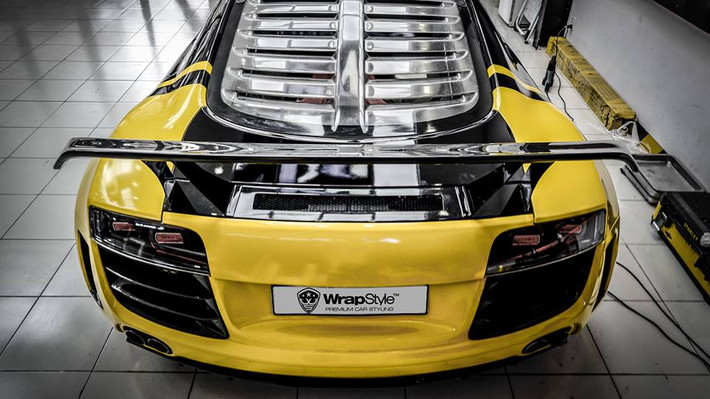 Nhiều người đánh giá, ý tưởng phối màu, dán đề can mới cho chiếc Audi R8 độ khủng lần này khá giống với siêu xe McLaren 650S Spider của Cường "Đô-la" từng thay đổi màu sơn để tham dự hành trình Car & Passion 2018.