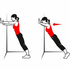 Động tác 3: "hít tường". Đứng cách tường 40cm, 2 tay chống thẳng vào tường. Thực hiện 10 lần động tác chống đẩy vào tường.