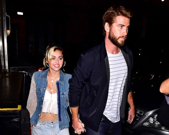 Cuối cùng sau nhiều biến cố Miley và Liam đã công khai mối quan hệ tại Power of Women vào tháng 10/2016. Ảnh: Theknotnews.com