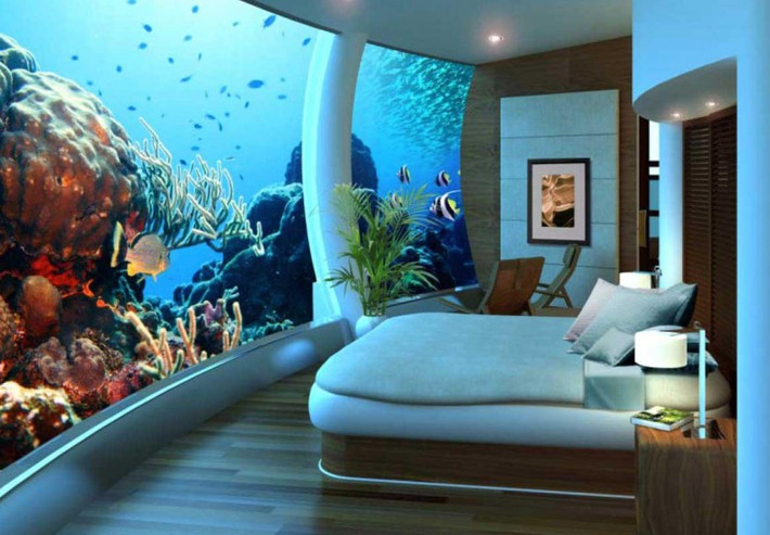 6. Poseidon Undersea Resort, Fiji Nếu bạn mơ ước một nơi nghỉ ngơi nhiệt đới, gần gũi với các sinh vật của biển? Bạn hãy thực hiện giấc mơ đó ở Poseidon Undersea Resort ở Fiji. Poseidon hiện vẫn đang được xây dựng và nó sẽ là một nơi nghỉ ngơi kỳ diệu. Các tiện nghi tại đây sẽ bao gồm tàu ngầm cá nhân, thư viện, phòng khách….