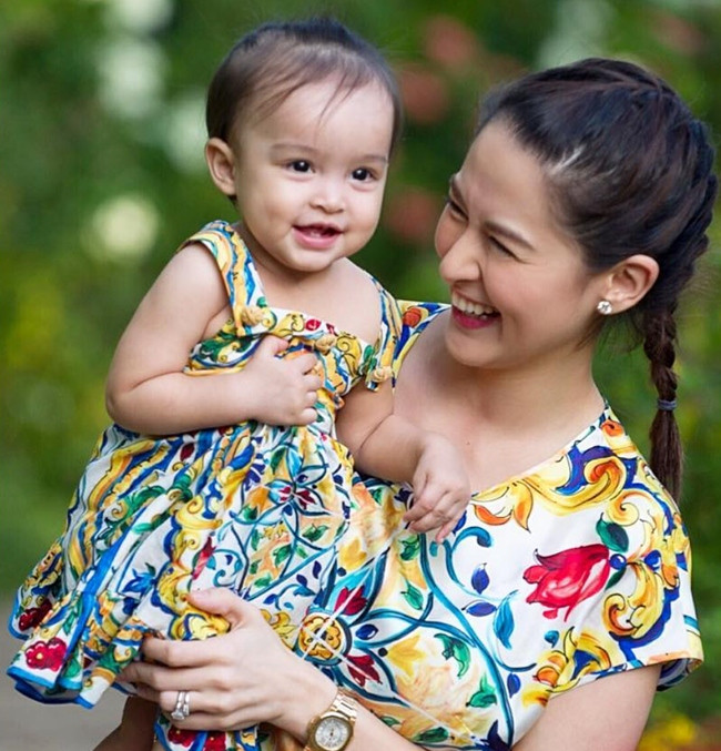 6. Nụ cười "tỏa nắng" của hai mẹ con làm đốn tim hàng triệu người. Ảnh: tammoingay.com.