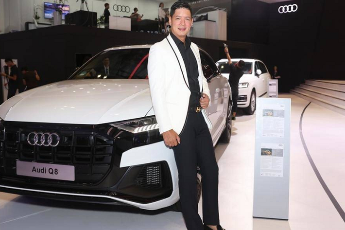 Siêu mẫu Bình Minh bên Audi Q8 - thành viên thể thao mới nhất của đại gia đình Audi Q kết hợp sự thanh lịch của một chiếc coupe sang trọng 4 cửa với tính linh hoạt thực dụng của một chiếc SUV cỡ lớn cho cả mục đích kinh doanh và giải trí