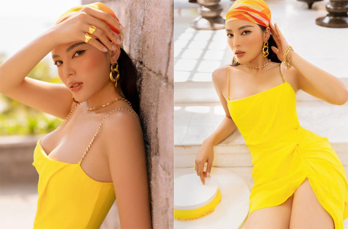 Hoa hậu Kỳ Duyên luôn biết chọn cho mình những trang phục tôn được điểm mạnh của cơ thể, ví dụ như chiếc váy vàng hai dây trễ ngực và xẻ cao đùi này.