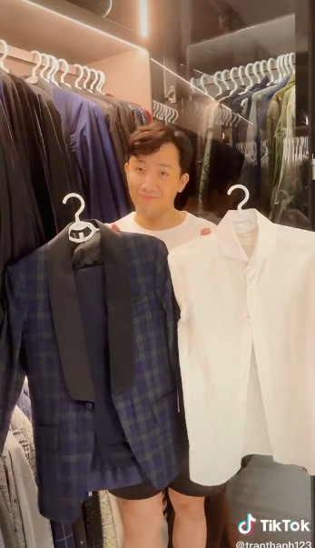 Trong đoạn clip TikTok mới đây, "Bố già" Trấn Thành gây choáng với tủ đồ thời trang sành điệu đa màu sắc.