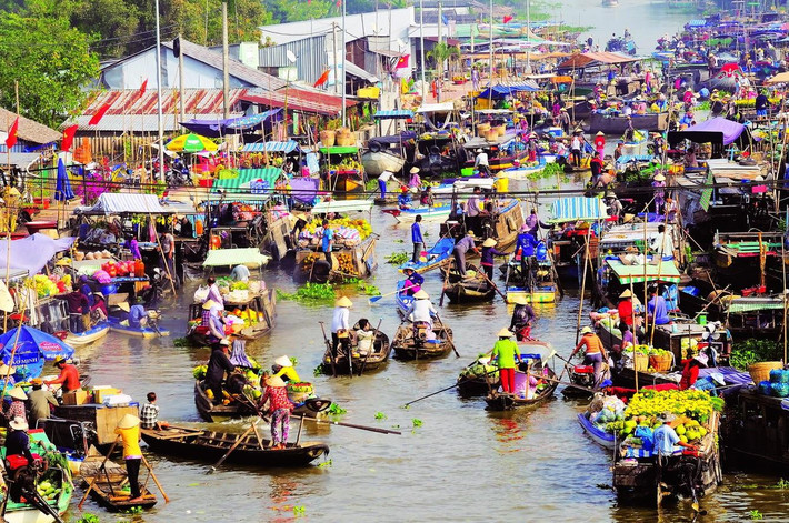 Không sở hữu vẻ tráng lệ với những toà lâu đài cổ kính hay không gian lãng mạn, Cần Thơ ghi dấu ấn với du khách trong và ngoài nước bởi nét mộc mạc và cảnh giao thương tấp nập miền sông nước. Ảnh: vietravel.com