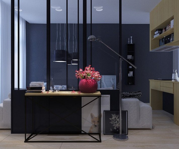 Các khu vực sinh hoạt xoay quanh một nhà bếp màu trầm tối sang trọng. Thiết kế mở mang đến cảm giác kết nối nhiều hơn giữa các thành viên trong nhà.