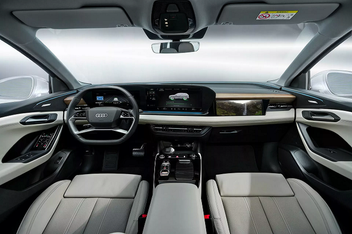 Ngoại hình Audi Q6 e-tron khá tương đồng với các mẫu SUV điện gầm cao cùng hãng. Thiết kế thanh lịch và mặt ca lăng kín, hệ thống đèn hiện đại, cụm mâm lạ mắt... được thiết kế dạng prototype, chỉ để làm phần "khung" để hãng hé lộ nội thất đáng chú ý.