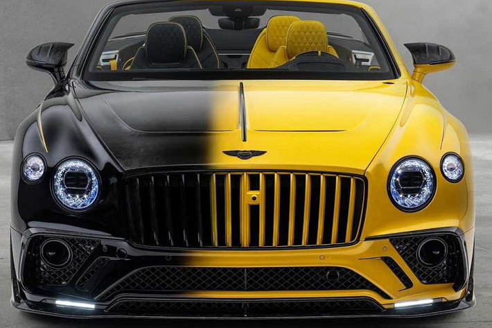Bên trong nội thất. bảng điều khiển trung tâm được trang trí bằng bảng tên Mansory Vitesse có nội dung "One of One".