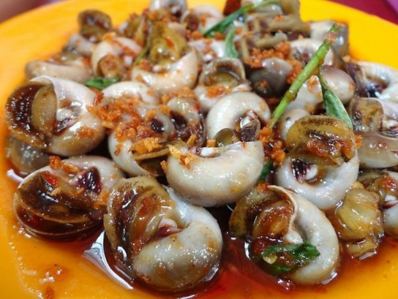 Ốc mỡ có thể chế biến thành nhiều món nhưng ngon nhất vẫn là ốc mỡ xào me và xào rau răm. (Ảnh Postimg)