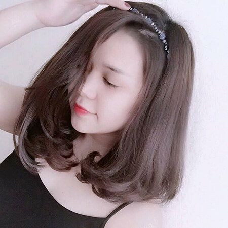 Kiểu tóc cụp đuôi mang đến một vẻ ngoài thật đáng yêu và ngọt ngào cho bạn, đồng thời cũng tạo cảm giác mặt bạn thon nhỏ hơn. Ảnh: pinimg.