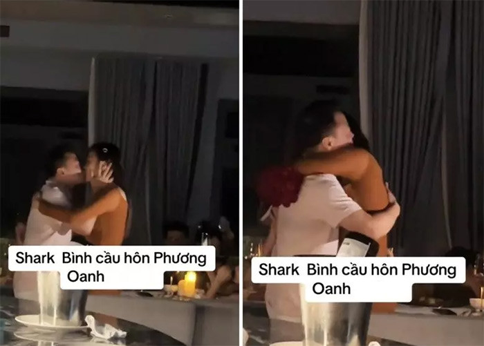 Trên mạng xã hội mới lan truyền clip quay cảnh Shark Bình cầu hôn Phương Oanh. Theo clip chia sẻ trên mạng, Shark Bình đã quỳ gối tặng hoa cho nữ diễn viên "Quỳnh búp bê", sau đó cả hai ôm chặt lấy nhau và trao nhau nụ hôn nồng nàn. (Ảnh: Người đưa tin)
