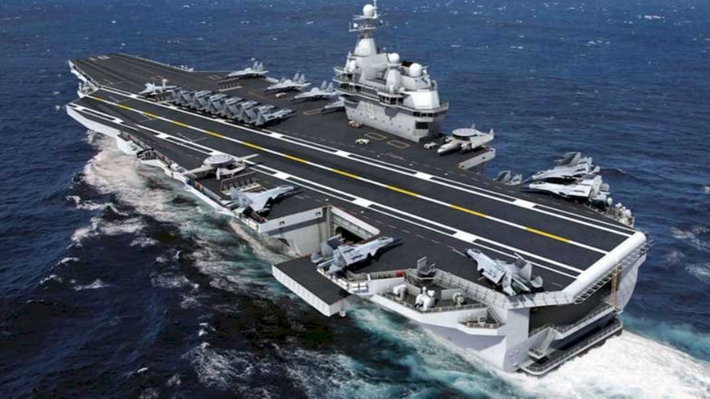 Không giống như các tàu Liêu Ninh và Sơn Đông, tàu Type 003 áp dụng phương pháp đóng tàu module tiên tiến nhất của thế giới hiện nay; các phần của con tàu được đóng sẵn từ các nhà máy đóng tàu khác nhau của Trung Quốc, sau đó được đưa đến nhà máy lắp ráp, vì vậy tiết kiệm được nhiều thời gian thi công. Ảnh: Đồ họa tàu sân bay Type 003 – Nguồn: Sina