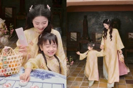 Hot mom Nam Thương cùng con gái diện áo dài đôi, nhẹ nhàng đón chờ Xuân 2026