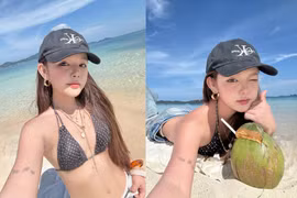 "Hot girl có gương mặt em bé" style đi biển nửa kín nửa hở cuốn hút