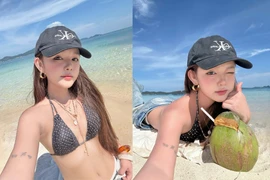 "Hot girl có gương mặt em bé" style đi biển nửa kín nửa hở cuốn hút