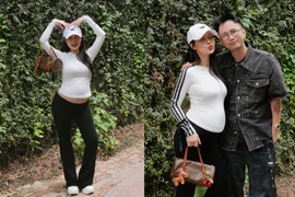 Vợ hot girl của Rhymastic xả kho ảnh Tết sau ‘2 tuần ăn no ngủ kỹ’