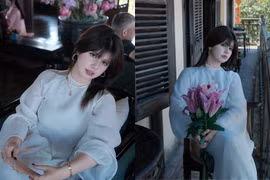 'Bông hồng lai' Ebra Lê diện áo dài duyên dáng, hòa vào không khí Tết Việt