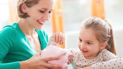 Cha mẹ nên dạy con tiết kiệm từ việc nhỏ