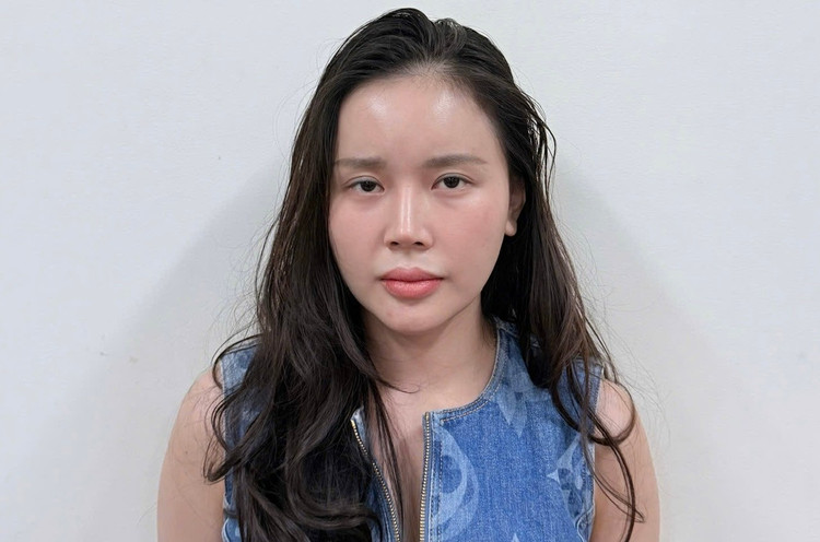 Lê Hương Ly tại cơ quan điều tra. 87766.jpg