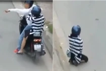 Video: Cô gái quỳ gối xuống đường sau cái chỉ tay của bạn trai