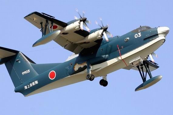 US-2 là loại thủy phi cơ trinh sát hiện đại nhất thế giới của Nhật Bản, có tính năng vượt trội hơn cả Be-200 của Nga. Đây cũng là loại thủy phi cơ cỡ lớn đầu tiên trên thế giới sử dụng cabin chịu lực giúp máy bay có thể chịu được áp suất khi bay trên độ cao tối đa 9km/h và chịu được sức va đập của sóng gió lớn. Chiếc US-2 có tầm hoạt động tới 4.700 km, bán kính tác chiến 2.200 km, có khả năng cất, hạ cánh trên mặt biển trong điều kiện sóng cao 3m.