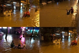 “Trắng đêm” bì bõm trong biển nước trên đường Nguyễn Hữu Cảnh