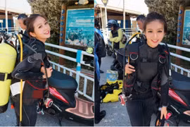 Nữ thợ lặn mặc "kín như bưng" vẫn khiến đấng mày râu xao xuyến