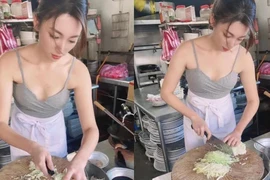 Quá xinh đẹp, hot girl bán cơm rang gây náo loạn cả chợ