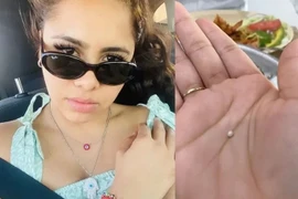 Đi ăn hàu, cô gái bất ngờ cắn trúng ngọc trai quý