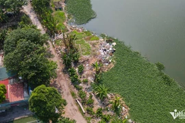 Hồ Đầm Đỗi bị san lấp trái phép giữa Thủ đô?