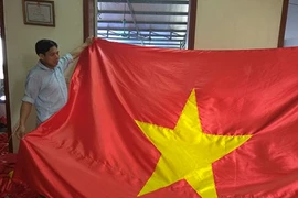 Sự thật ly kỳ về lá cờ Tổ quốc kỷ lục 54 m2 ở Hà Giang