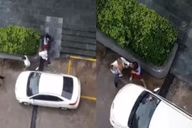 Clip chồng 1 tay bế con 1 tay đánh vợ khiến dân tình phát sợ