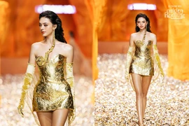 Ảnh nét căng màn catwalk của vợ mẫu tây Bùi Tiến Dũng