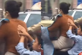 Bé trai che chắn điểm lộ "nhạy cảm" của mẹ khiến dân mạng xôn xao