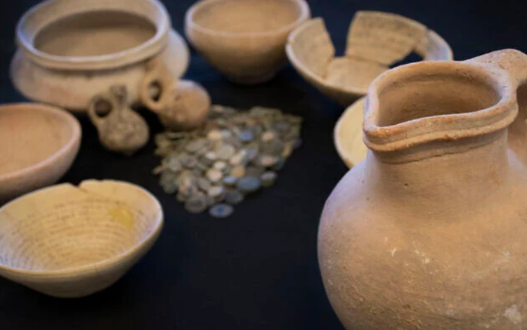 They raided an apartment containing hundreds of ancient coins, glassware and weapons, as well as three magic bowls originating from Iraq in the 5th-7th centuries AD. Photo: @IAA. 2-4484.png