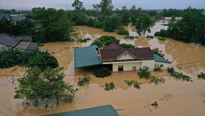 Lũ lớn trên sông Hiếu gây ngập diện rộng tại khu vực xã Thanh An, huyện Cam Lộ, tỉnh Quảng Trị. Ảnh: TTXVN.