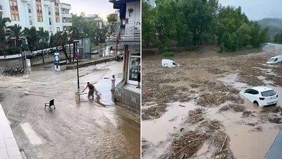 Cảnh đường phố biến thành sông ở Tây Ban Nha vì mưa lũ