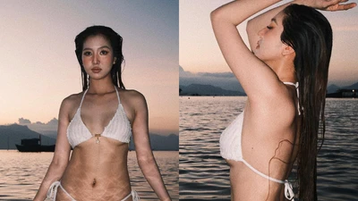Bà xã Hồ Quang Hiếu diện bikini đón hoàng hôn trên biển