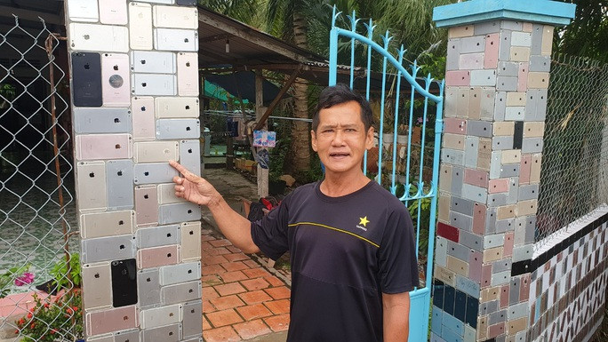 Ý tưởng độc đáo này là của người cháu ông Tấn, làm nghề sửa chữa điện thoại iPhone. Ảnh: Nlđ